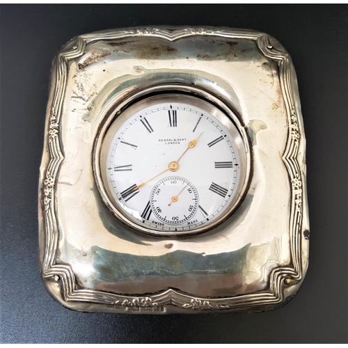 143 - CONTINENTAL SILVER CASED POCKET WATCH IN SILVER MOUNTED STAND
the white enamel dial marked 'Kendal &... 