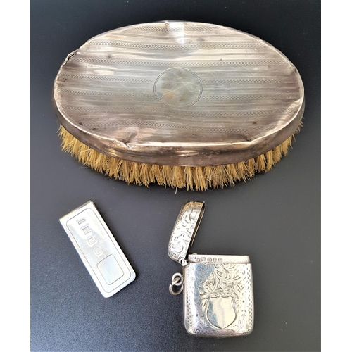 144 - SMALL SELECTION OF SILVER ITEMS
comprising a money clip with decorative hallmarks for Birmingham 198... 