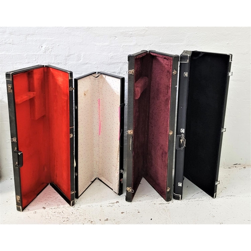 423 - FOUR HARD SHELL INSTRUMENT CASES
three with fitted faux fur interiors for guitars; and a smaller cas... 