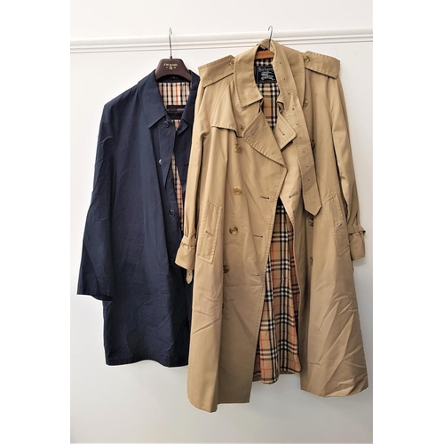 393 - TWO GENTLEMEN'S RAIN COATS
comprising one Burberry in fawn with traditional check lining, 48R; and a... 