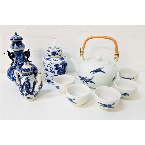 157 - SELECTION OF EAST ASIAN BLUE AND WHITE CERAMICS
including a tea pot with a swing bamboo handle and f... 