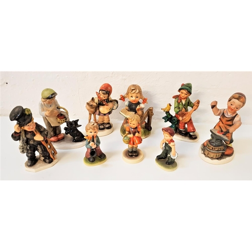 192 - SELECTION OF FRIEDEL AND SIMILAR FIGURINES
the five Friedel examples depicting  a blacksmith, a boy ... 