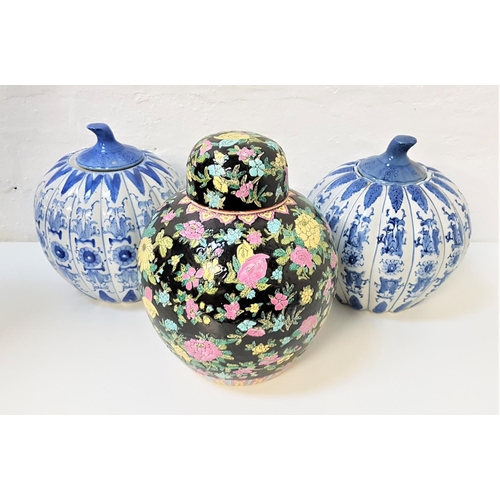 223 - PAIR OF CHINESE BLUE AND WHITE VASES
shaped as gourds with stork type lids, 27cm high, together with... 