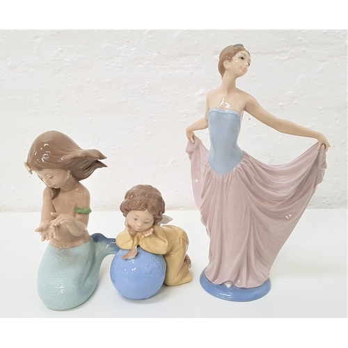 216 - THREE LLADRO AND NAO FIGURINES
comprising a Lladro figure of an elegant lady in an evening dress, th... 