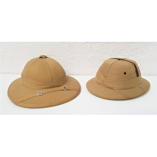 389 - TWO CLOTH COVERED PITH HELMETS
one size 7, the other with adjustable headband (2)