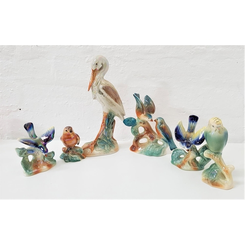 198 - SIX CAMPSIE WARE LUSTRE FIGURINES
including a stork, pair of birds, robin, budgie and two blue tits ... 