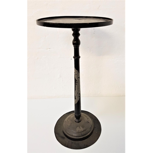 646 - CHINESE EBONISED OCCASIONAL TABLE
raised on a circular metal base with a circular wood dome and colu... 