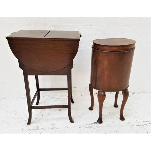 661 - MAHOGANY D SHAPED SEWING TABLE
with a lift up lid revealing a lift out tray, standing on cabriole su... 