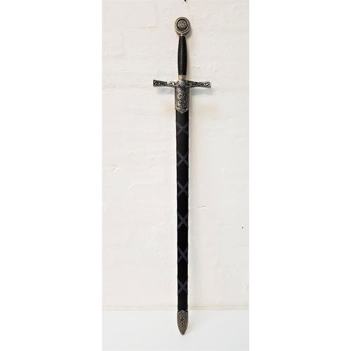 417 - KING ARTHUR'S SWORD
marked to the pommel and scabbard 'Excalibur', with a textured grip and double e... 