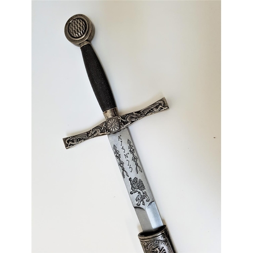 417 - KING ARTHUR'S SWORD
marked to the pommel and scabbard 'Excalibur', with a textured grip and double e... 