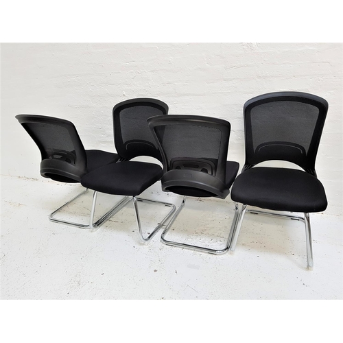 621 - SET OF FOUR OFFICE CHAIRS
with shaped mesh fabric backs above black fabric padded seats, on a tubula... 