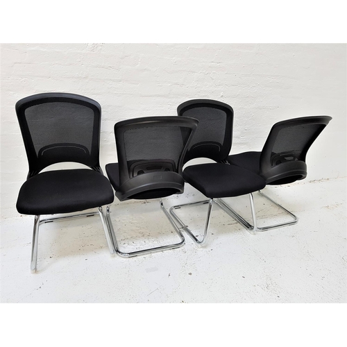 623 - SET OF FOUR OFFICE CHAIRS
with shaped mesh fabric backs above black fabric padded seats, standing on... 