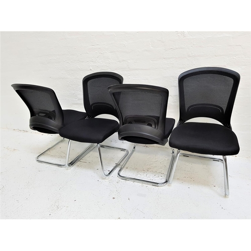 628 - SET OF FOUR OFFICE CHAIRS
with shaped mesh fabric backs above black fabric padded seats, standing on... 