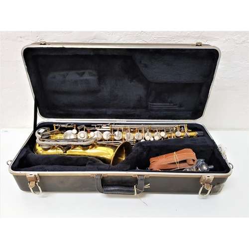 504 - CONN ALTO SAXAPHONE
marked 3815907, with mother of pearl disc buttons, with mouthpiece, neck strap a... 