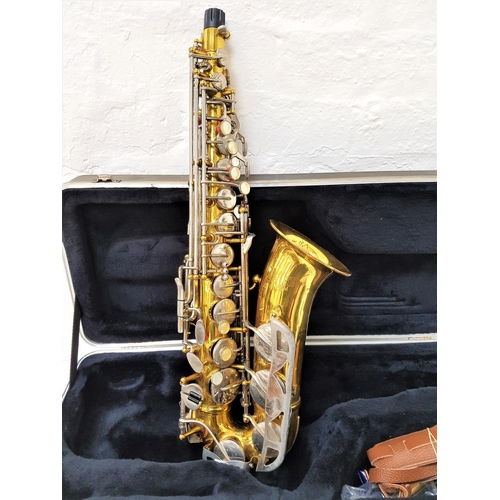 504 - CONN ALTO SAXAPHONE
marked 3815907, with mother of pearl disc buttons, with mouthpiece, neck strap a... 