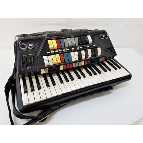 514 - FARFISA ELECTRIC ACCORDION
with multiple buttons and shoulder strap