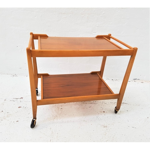 613 - TEAK HOSTESS TROLLEY
with side handles and two tiers, on wheels, 61cm high