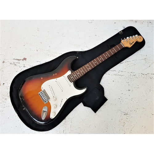 536 - FENDER SQUIER STRAT ELECTRIC GUITAR
with mother of pearl inlay to the neck, serial number YN612557, ... 