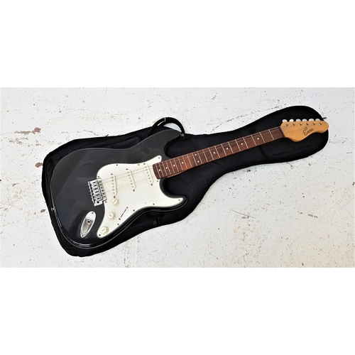 539 - ENCORE ELECTRIC GUITAR
with mother of pearl inlay to the neck, with a gloss black and white body wit... 