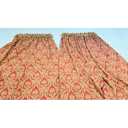 577 - PAIR OF LARGE CURTAINS
lined, with a claret ground and stylised flower motifs, with a dark green and... 