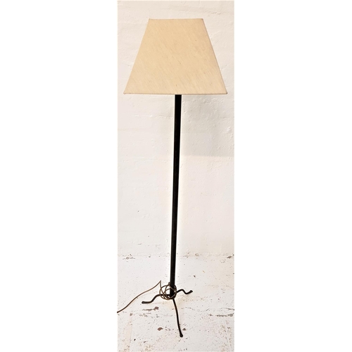 602 - TUBULAR STEEL STANDARD LAMP
raised on a tripod base with a tubular column and shaped shade, 142cm hi... 