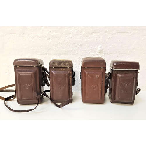 373 - FOUR SEAGULL TWIN LENS REFLEX CAMERAS
each with a Haiou 31 lenses, in leather cases (4)