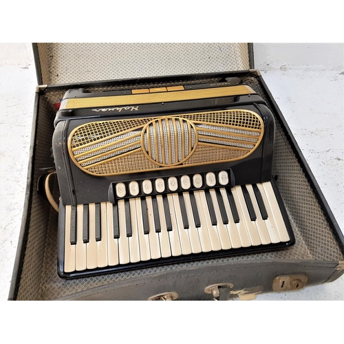 509 - HOHNER VERDI IIN ACCORDION 
with a black gloss with gilt highlights to the body, with shoulder strap... 