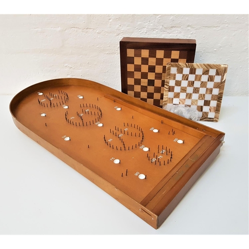 405 - SELECTION OF GAMES
including a Corinthan bagatelle board, a small marble chess board with metal figu... 