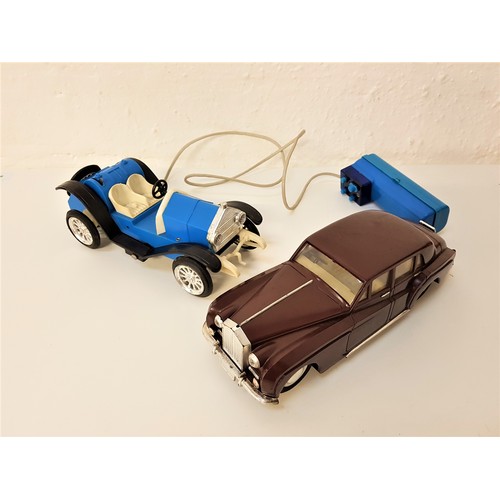 404 - LB ROLLS ROYCE TOY CAR
battery operated, in burgundy coloured plastic, together with an early 20th c... 