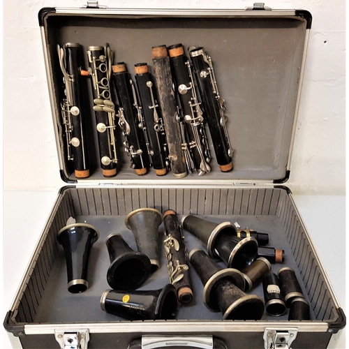 525 - SELECTION OF CLARINET PARTS 
comprising five lower sections, two with number marks - 374800 and 2800... 