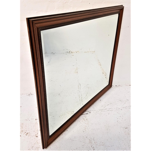 568 - LARGE RECTANGULAR WALL MIRROR
in a stained wood frame with a beveled plate, 107cm x 129.5cm