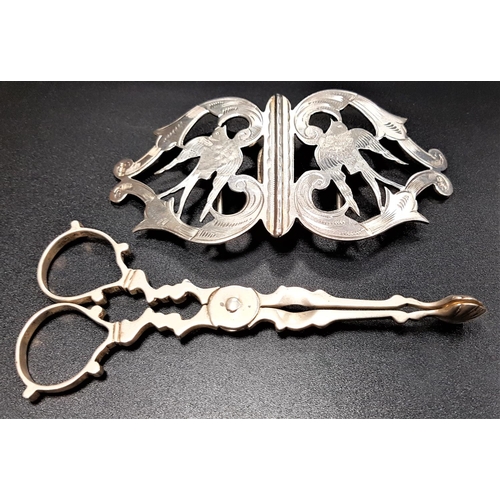 137 - EDWARD VII SILVER BUCKLE
the shaped and pierced buckle with engraved scroll and bird detail, Birming... 