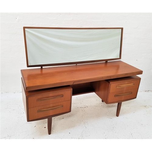 675 - RETRO G PLAN 'FRESCO' TEAK DRESSING TABLE
mid 20th century, with a framed rectangular mirror above a... 