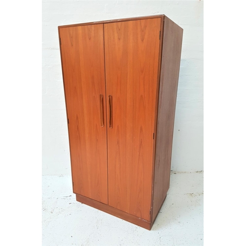 676 - RETRO G PLAN FRESCO TEAK WARDROBE 
mid 20th century, having twin doors with lipped and recessed hand... 