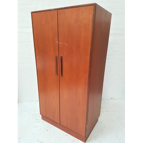 677 - RETRO G PLAN FRESCO TEAK WARDROBE 
having twin doors with lipped and recessed handles, the interior ... 