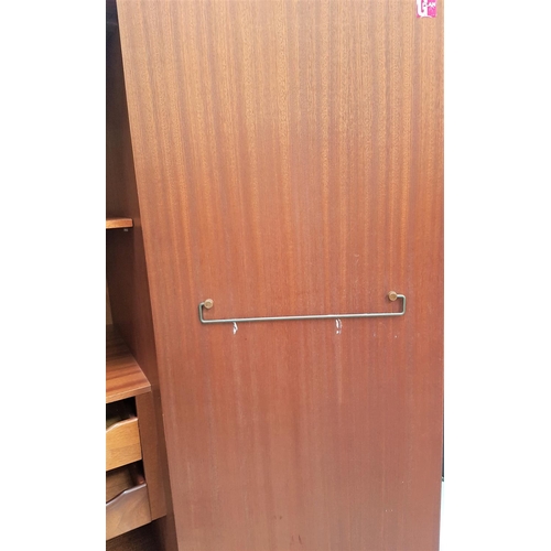 677 - RETRO G PLAN FRESCO TEAK WARDROBE 
having twin doors with lipped and recessed handles, the interior ... 