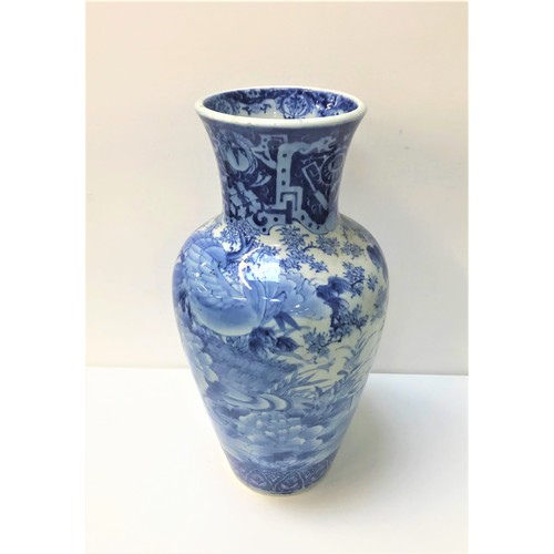 225 - LARGE CHINESE BLUE AND WHITE VASE
of baluster form decorated with birds in landscape settings to the... 