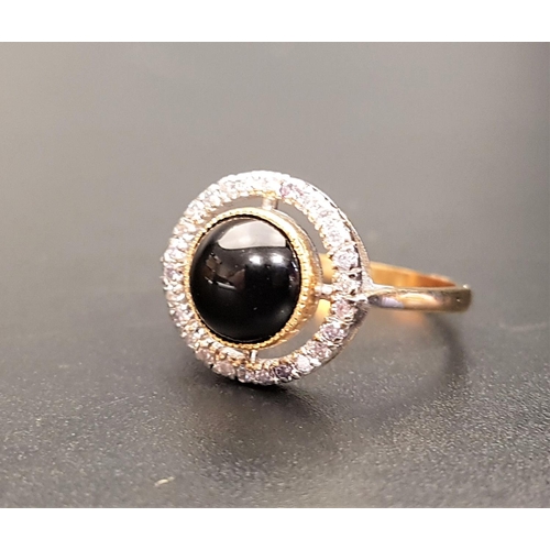 80 - ATTRACTIVE ONYX AND DIAMOND DRESS RING
the central round cabochon onyx in multi diamond surround wit... 