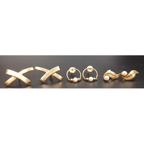 97 - THREE PAIRS OF NINE CARAT GOLD EARRINGS
two pairs with seed pearls and the other of X design, total ... 