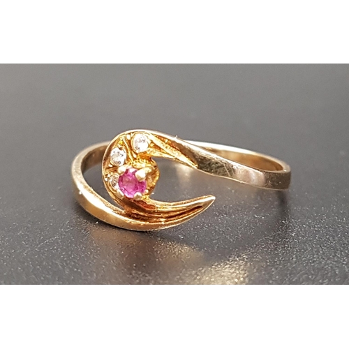 107 - RUBY AND DIAMOND TWIST DESIGN RING
on fourteen carat gold shank, ring size Q