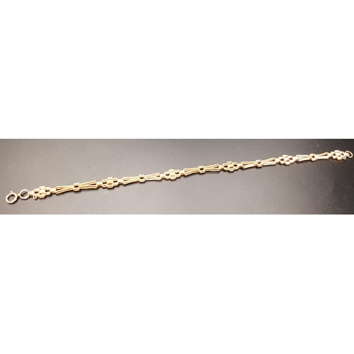 123 - NINE CARAT GOLD BRACELET
of gate link style, 19.8cm long and approximately 3.1 grams