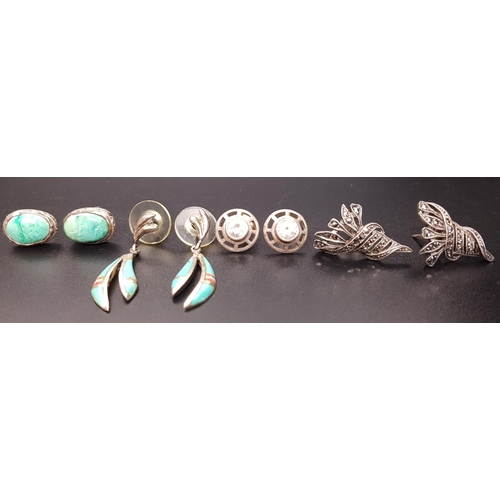 132 - FOUR PAIRS OF SILVER EARRINGS
of various designs including turquoise, marcasite and stone set (4 pai... 