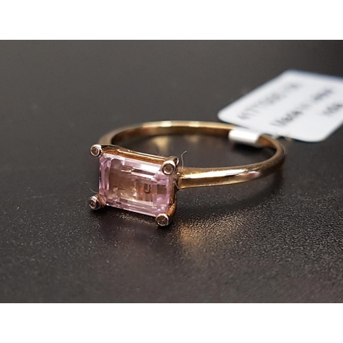 99 - CERTIFIED KUNZITE AND DIAMOND RING
the central octagon cut Mawi kunzite weighing 1.23cts, with a sma... 