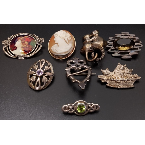 103 - GOOD SELECTION OF EIGHT SILVER BROOCHES
of various designs including a cameo brooch in silver mount ... 