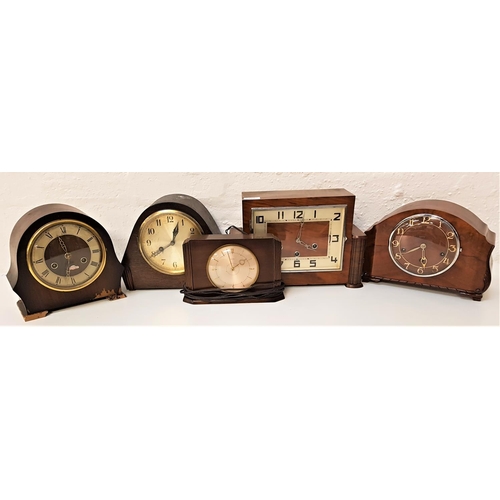 58 - ART DECO STYLE MANTLE CLOCK
in a walnut case with an oblong dial with Arabic numerals, similar arche... 