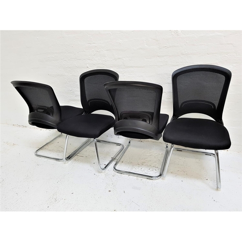 128 - SET OF FOUR OFFICE CHAIRS
with shaped mesh fabric backs above black fabric padded seats, standing on... 