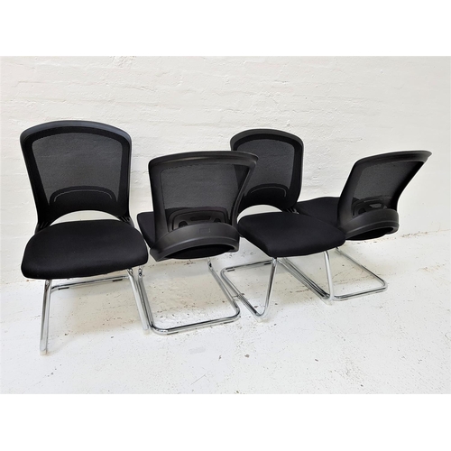 129 - SET OF FOUR OFFICE CHAIRS
with shaped mesh fabric backs above black fabric padded seats, standing on... 