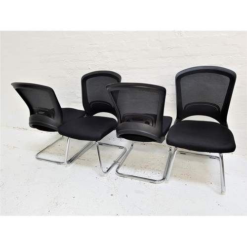 132 - SET OF FOUR OFFICE CHAIRS
with shaped mesh fabric backs above black fabric padded seats, standing on... 