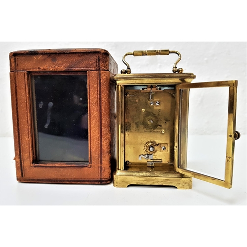 294 - GILT BRASS CARRIAGE CLOCK
the enamelled dial with Roman numerals and a French movement, with a fold ... 