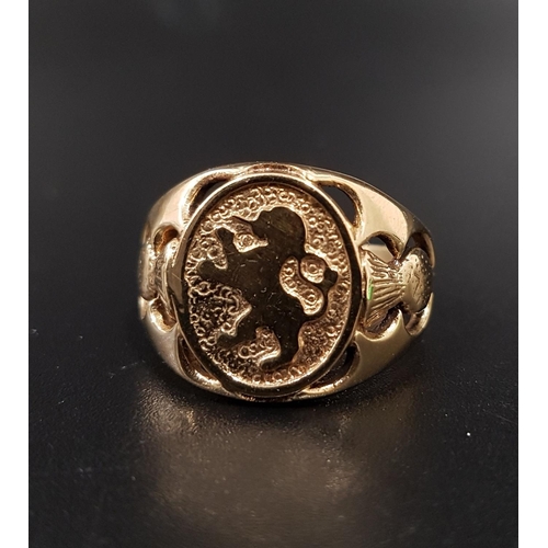 66 - UNUSUAL UNMARKED GOLD DRESS RING
the central oval panel depicting a lion rampant, with pierced thist... 